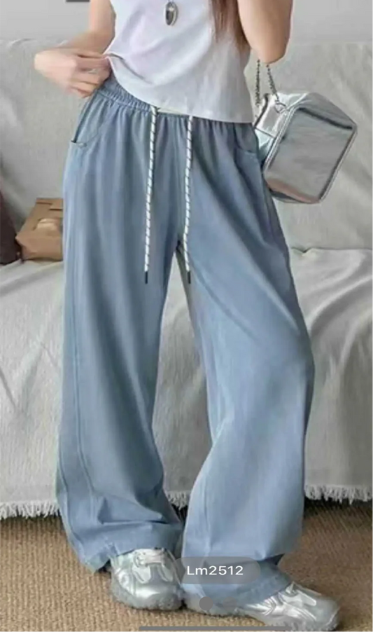 Woman in Lightweight Denim Jogger