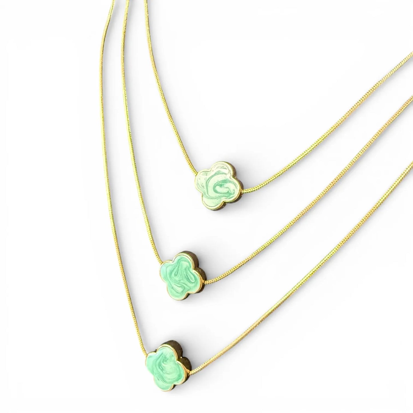 Jess & Lou Blue Multi-Layer Clover Pearlescent Necklace on a white background