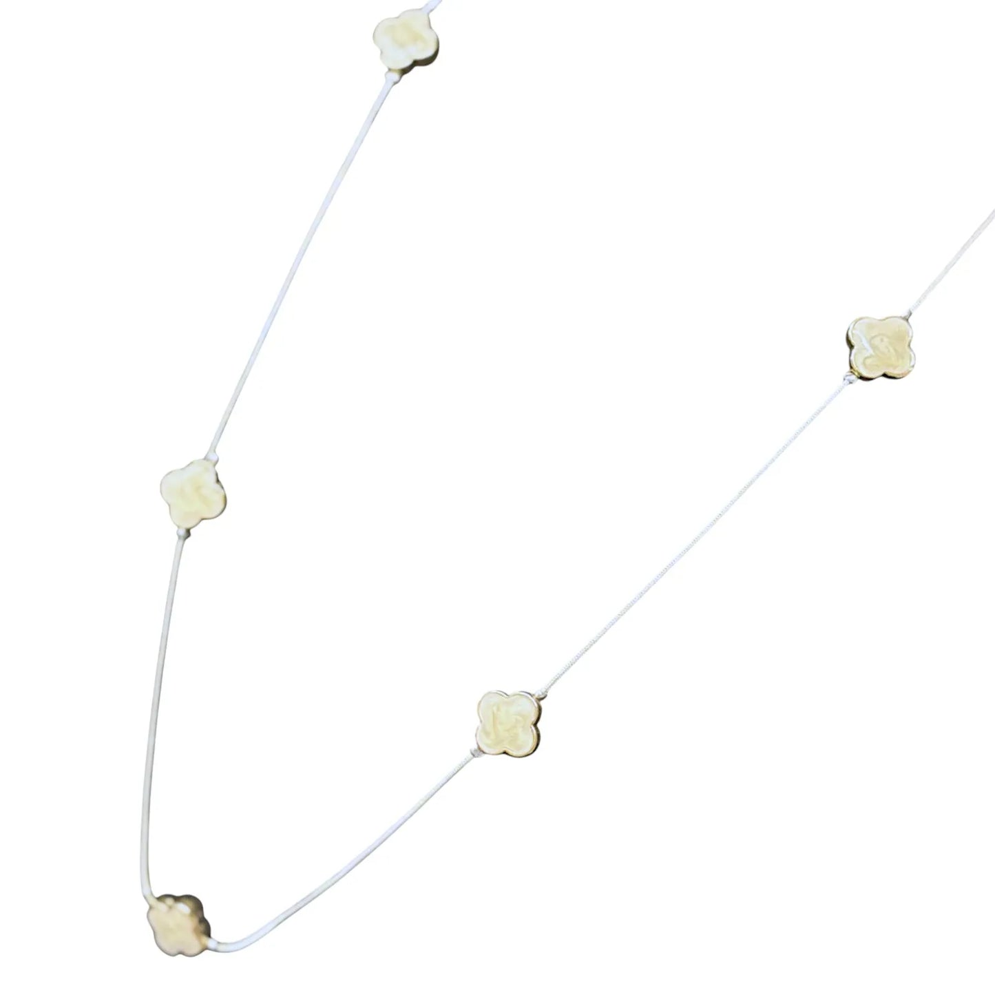 Jess & Lou White Clover Pearlescent Necklace on a white background