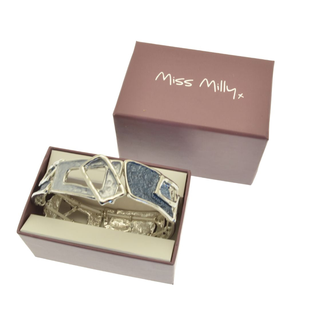 Decorative items in a box with 'Miss Milly' branding on a white background