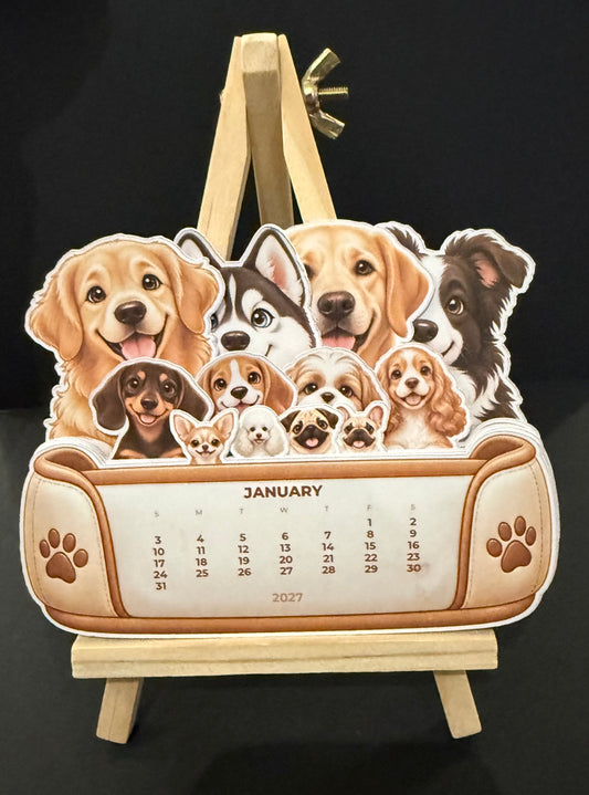 Dogs 2027 Desktop Stacking Calendar on an easel on a black background 
