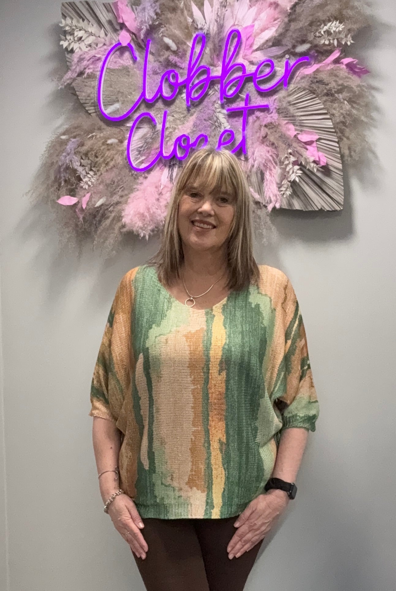 Woman Wearing Kurt Muller Marble Print V Fine Mesh Knit Top in Green 