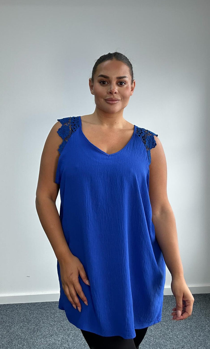 Woman in Royal Blue Plus Size Sleeveless Top with Lace Shoulder Detail