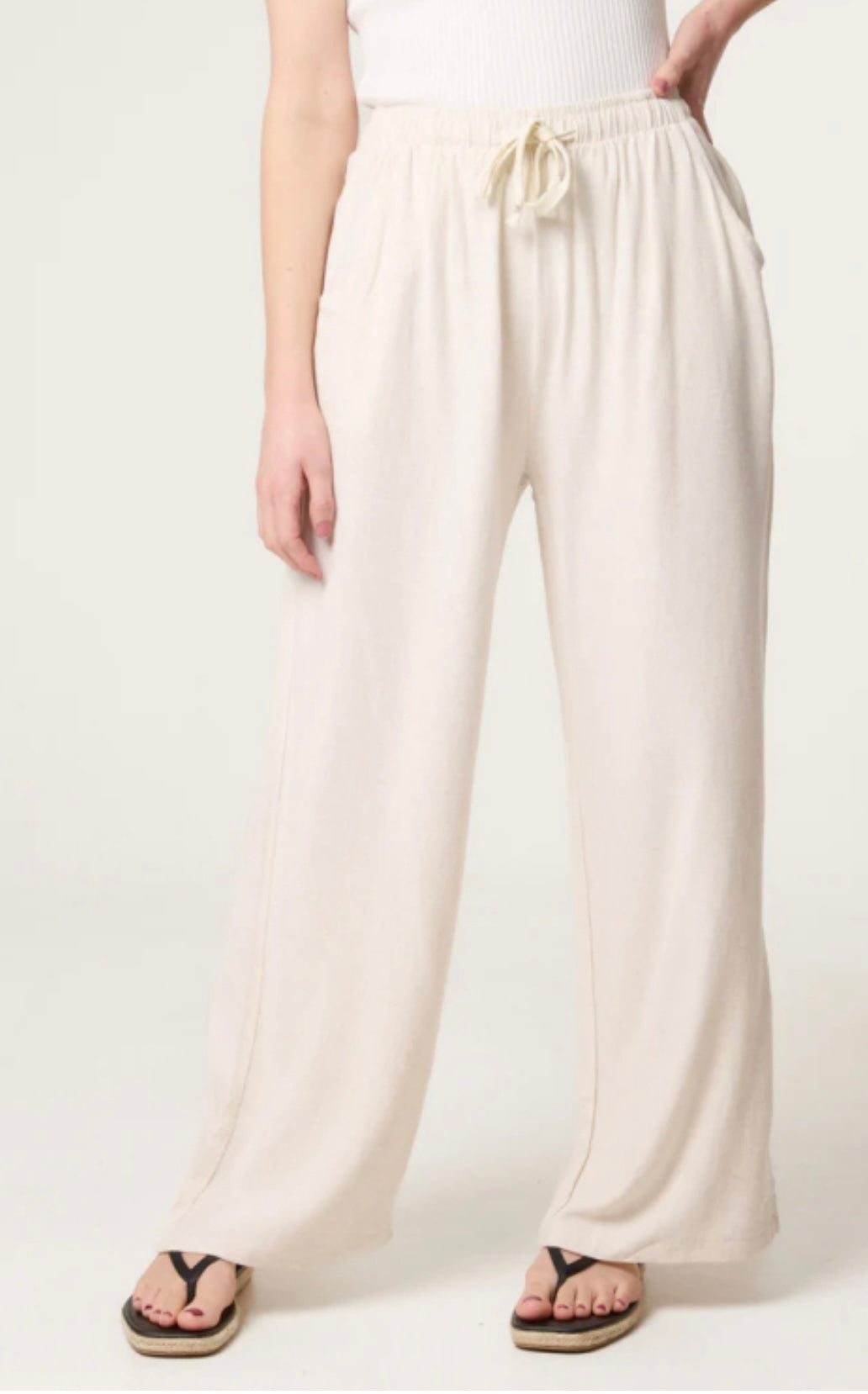 Beige Linen Blend Drawstring Pocket Trousers worn by a person on a white background