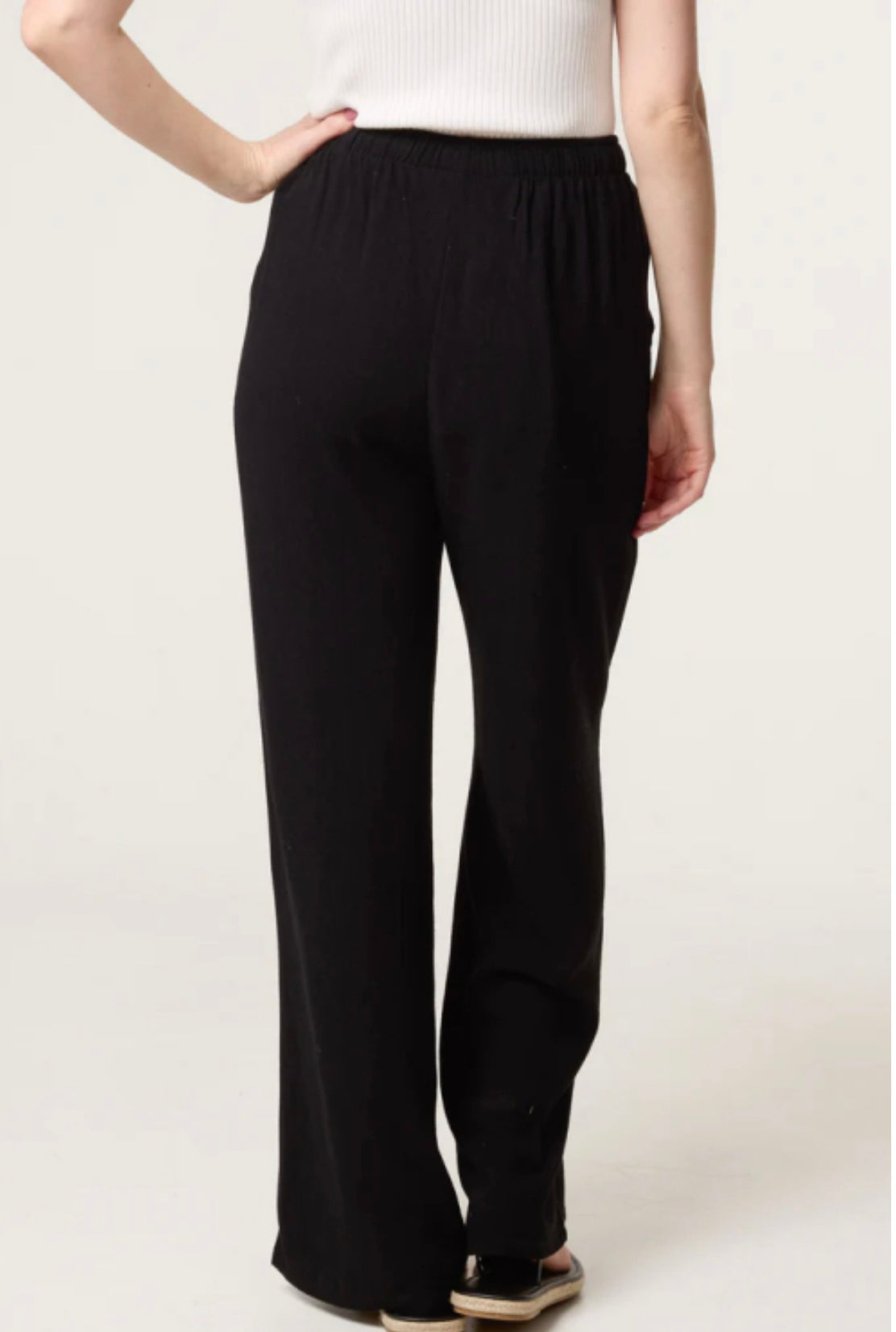 Black Linen Blend Drawstring Pocket Trousers worn by a person on a white background