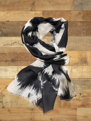 Black and White Art Brush Print Scarf on a wooden surface