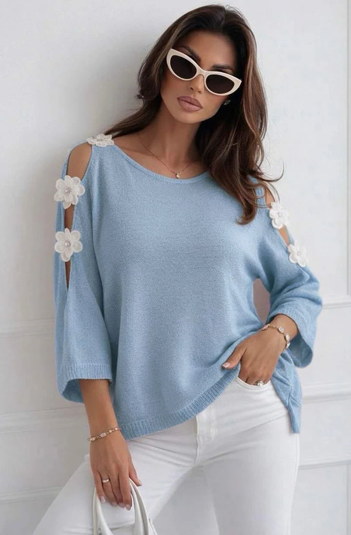 Woman in Blue Floral Appliqué Cold Shoulder Lightweight Open-Knit Top on white background 