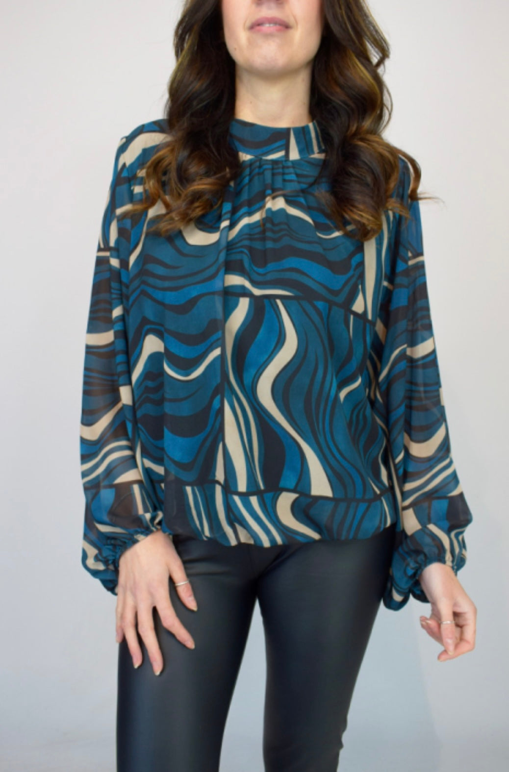 Woman wearing a Blue Geometric Volume Sleeve Italian Chiffon Blouse