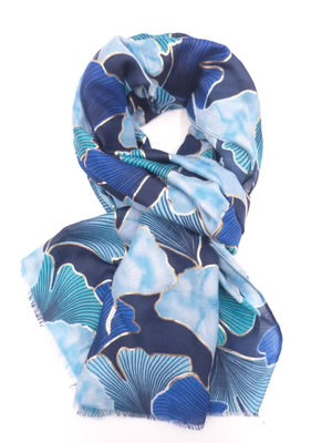 Blue and white floral patterned scarf on a white background