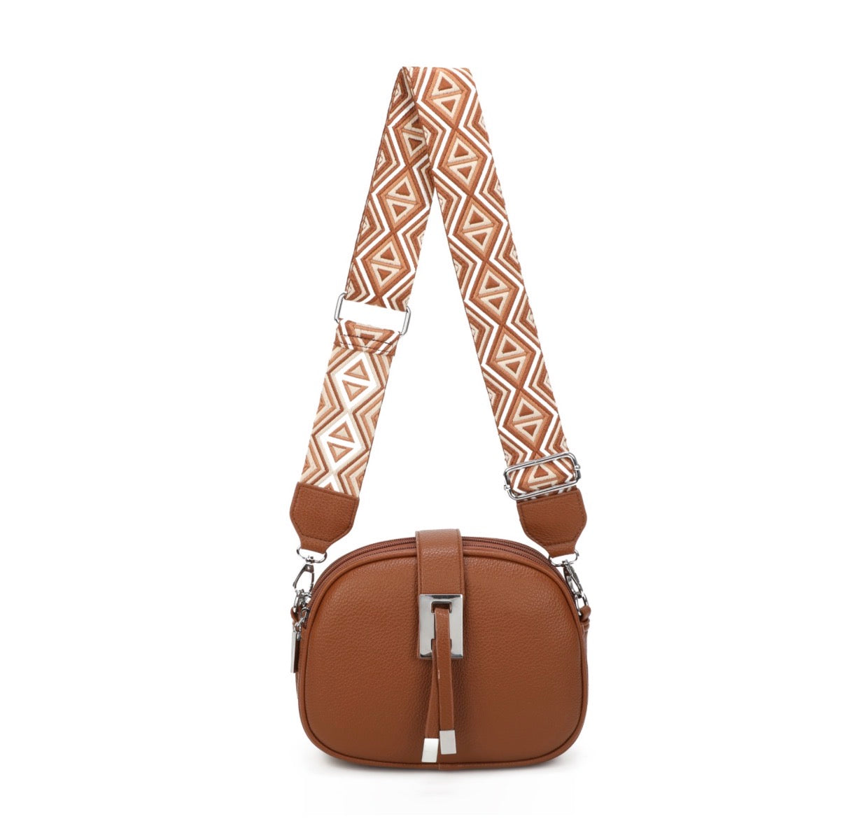 Brown handbag with a patterned strap on a white background