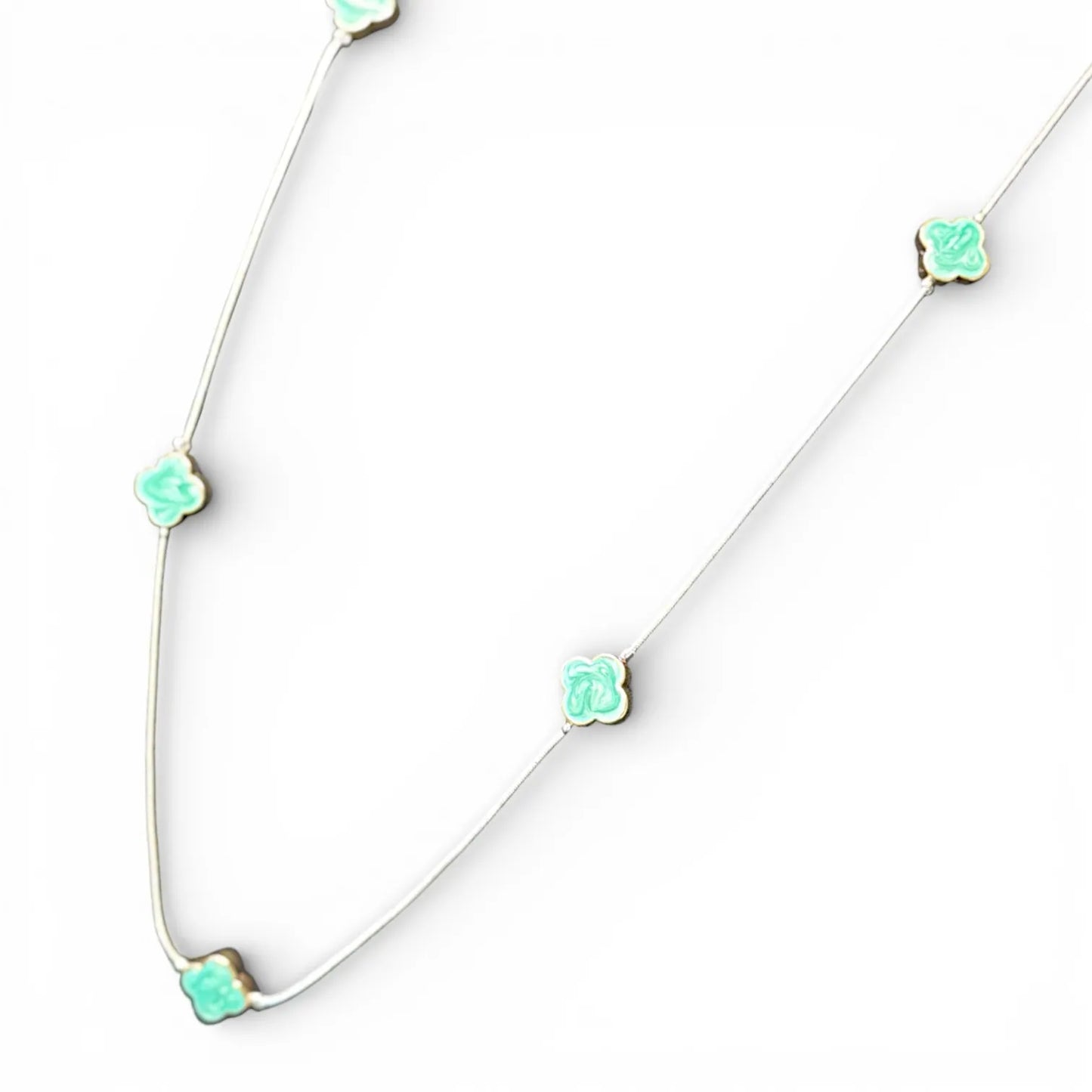 Jess & Lou Blue Clover Pearlescent Necklace on a white background