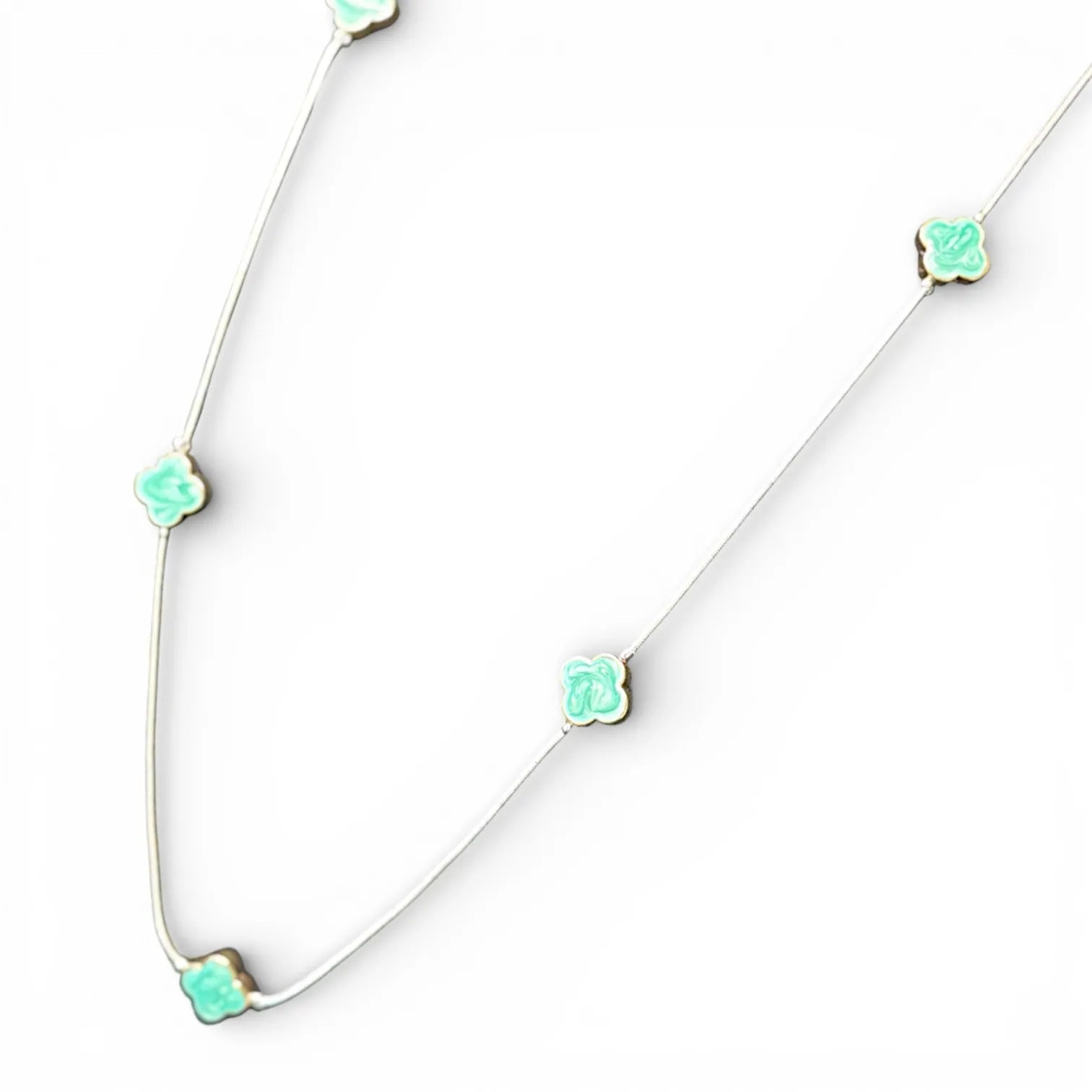 Jess & Lou Blue Clover Pearlescent Necklace on a white background
