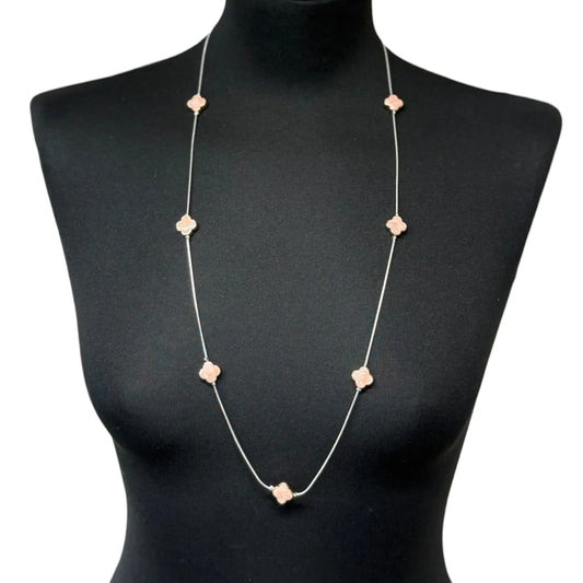 Jess & Lou Pink Clover Pearlescent Necklace on a black mannequin
