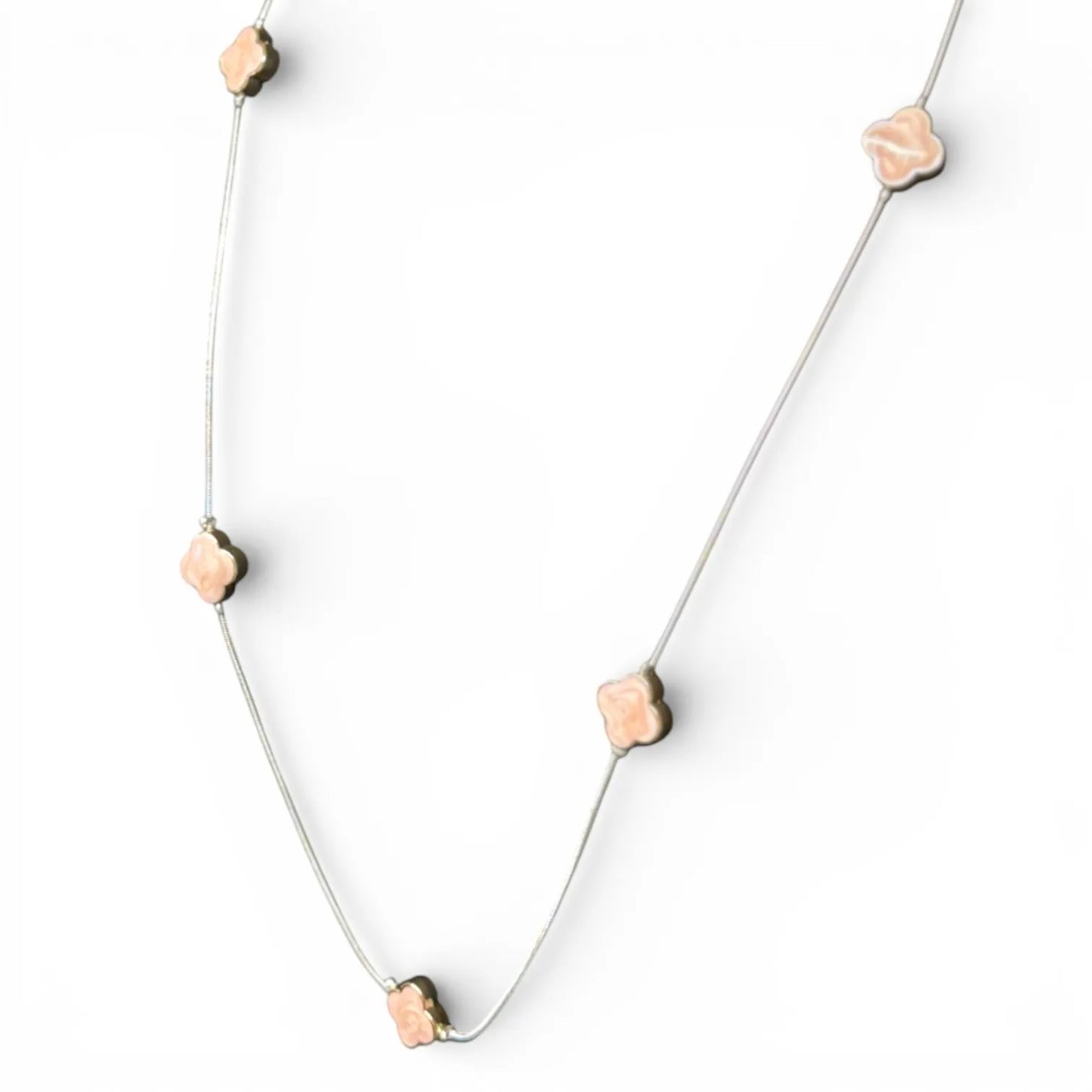 Jess & Lou Pink Clover Pearlescent Necklace on a white background