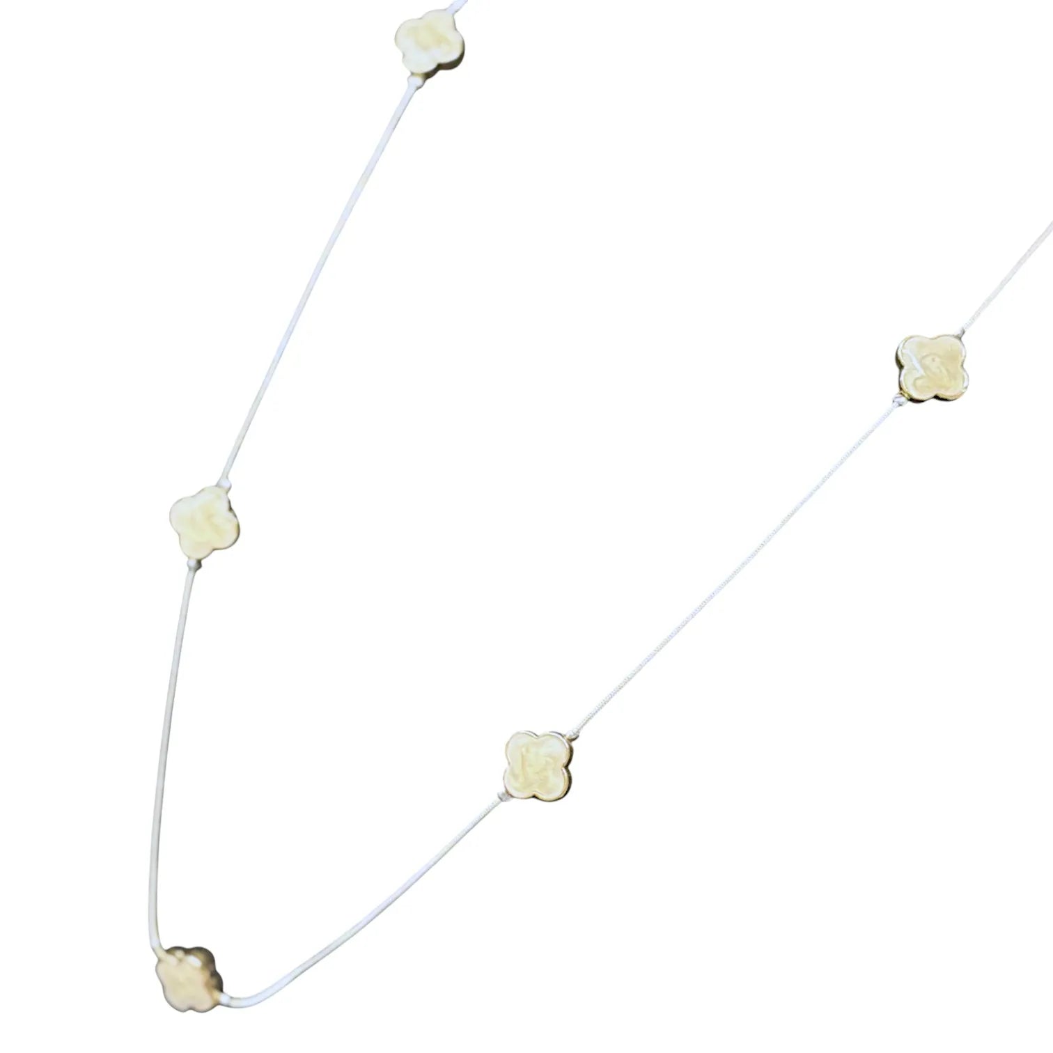 Jess & Lou White Clover Pearlescent Necklace on a white background