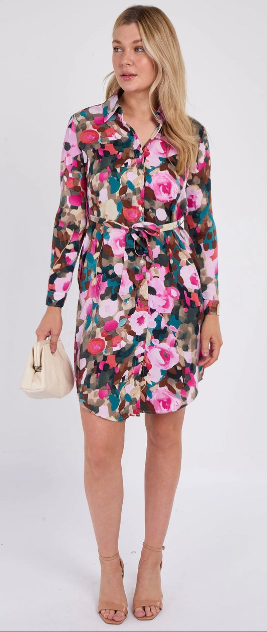 Woman wearing a floral dress with a white background
