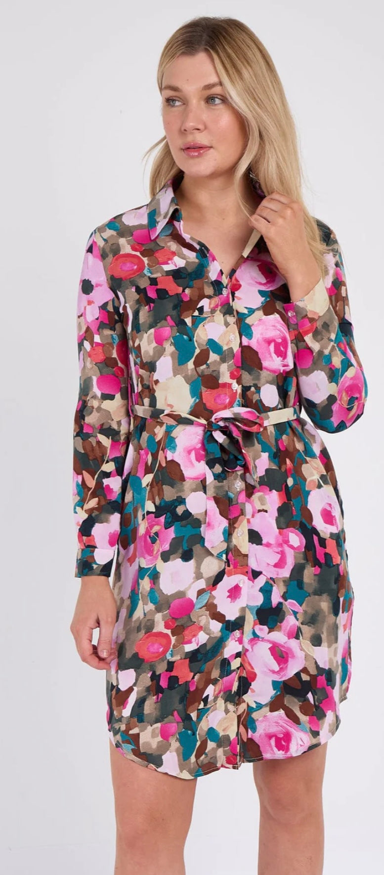 Woman wearing a floral dress on a white background