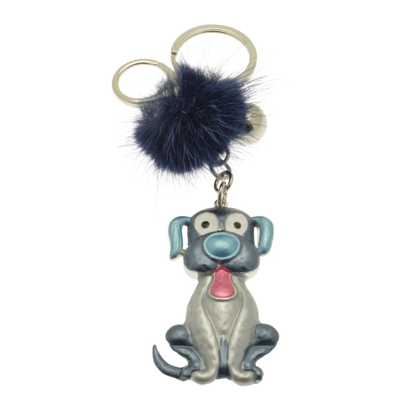 Dog-shaped keychain with a blue pom-pom on a white background