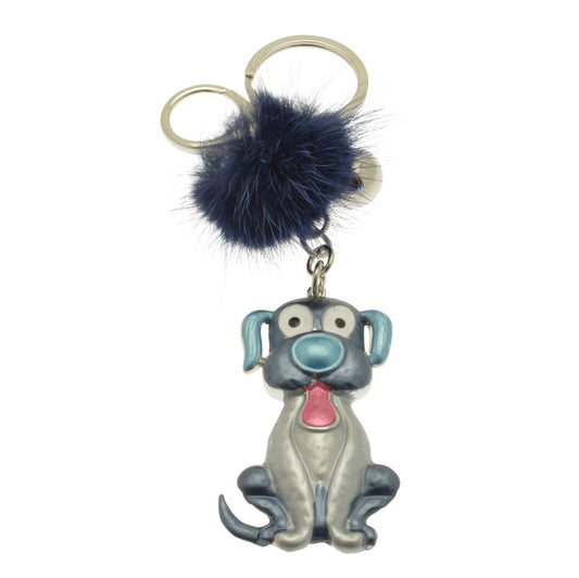 Dog-shaped keychain with a blue pom-pom on a white background