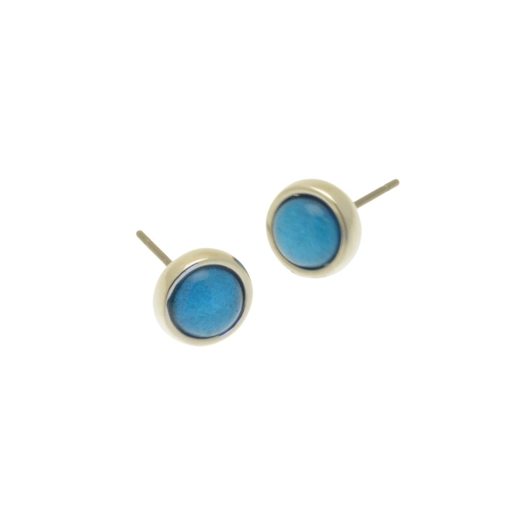 Pair of blue round stud earrings on a white background