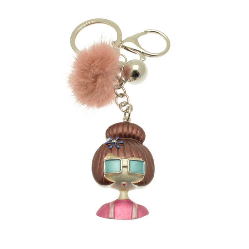 Keychain with a character design featuring a pink pom-pom on a white background