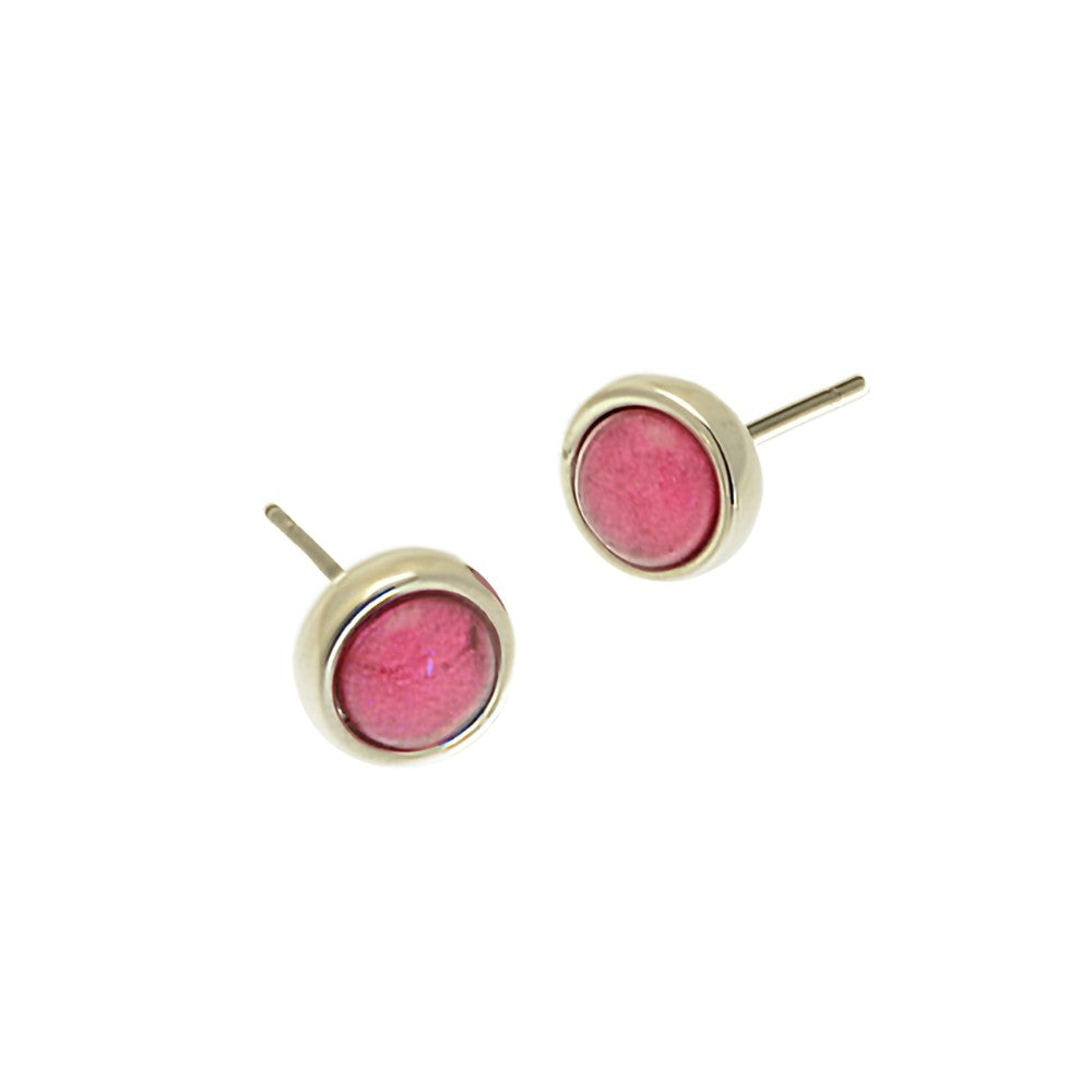 Pair of pink stud earrings with gold posts on a white background