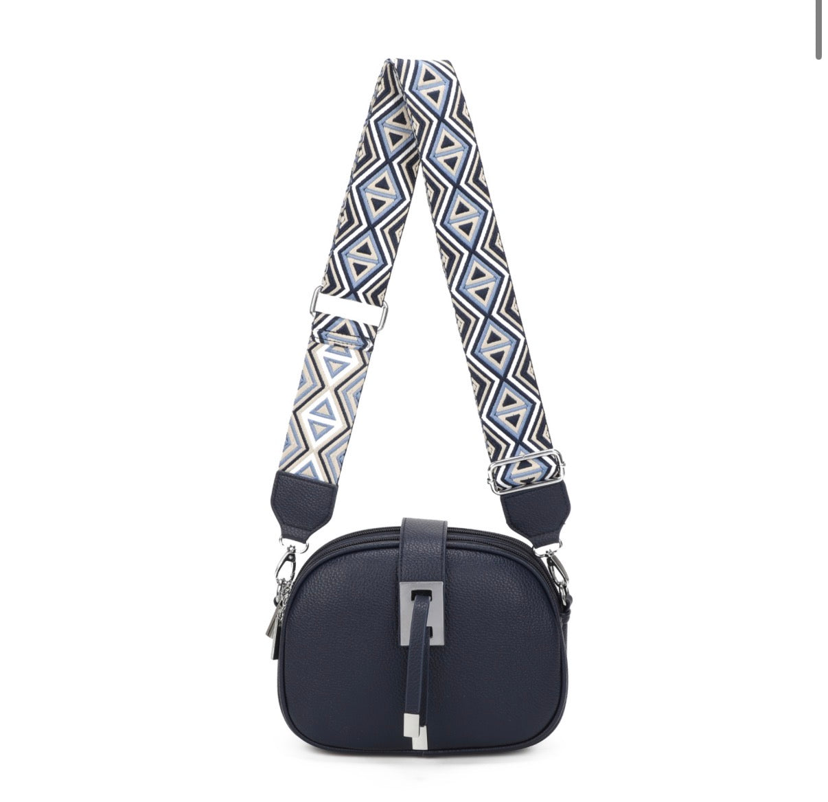 Navy blue handbag with a patterned strap on a white background