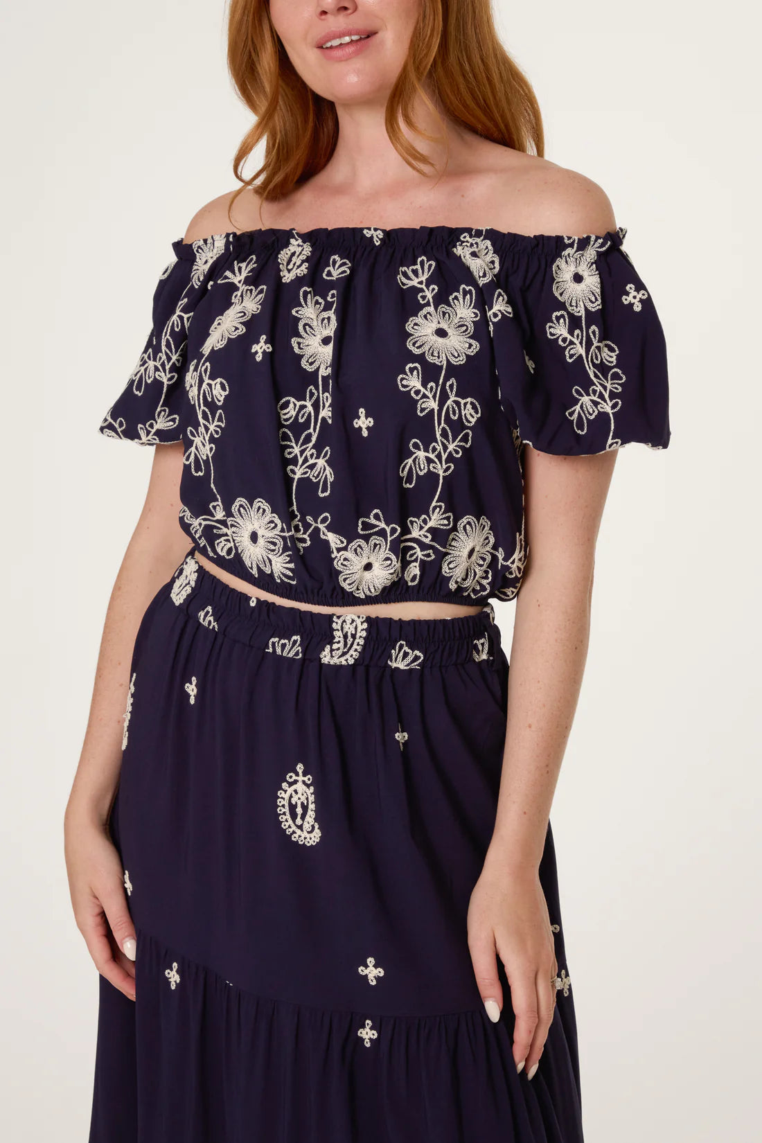 Navy Navy Embroidery Bardot Puff Top & Skirt Set with white floral embroidery on a white background