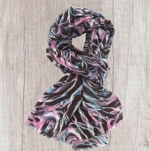 Colorful scarf on a wooden surface
