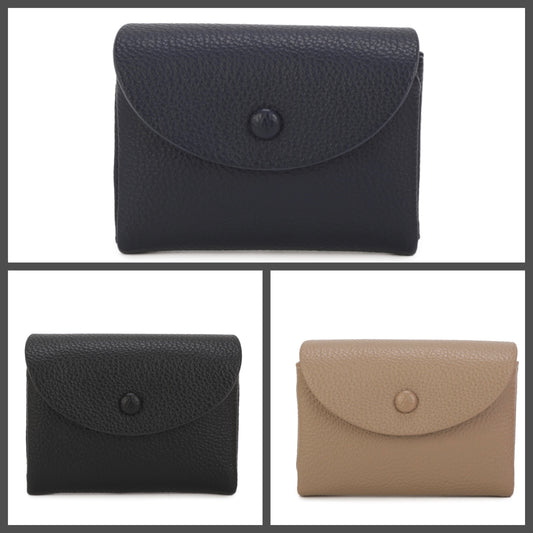Three small pebbled leather card cases shown on a white background, arranged in a collage: one large black case at the top and two smaller black and beige cases below.
