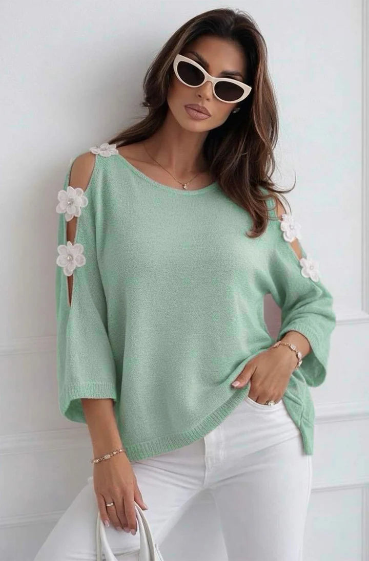 Woman in Sage Green Floral Appliqué Cold Shoulder Lightweight Open-Knit Top on white background 
