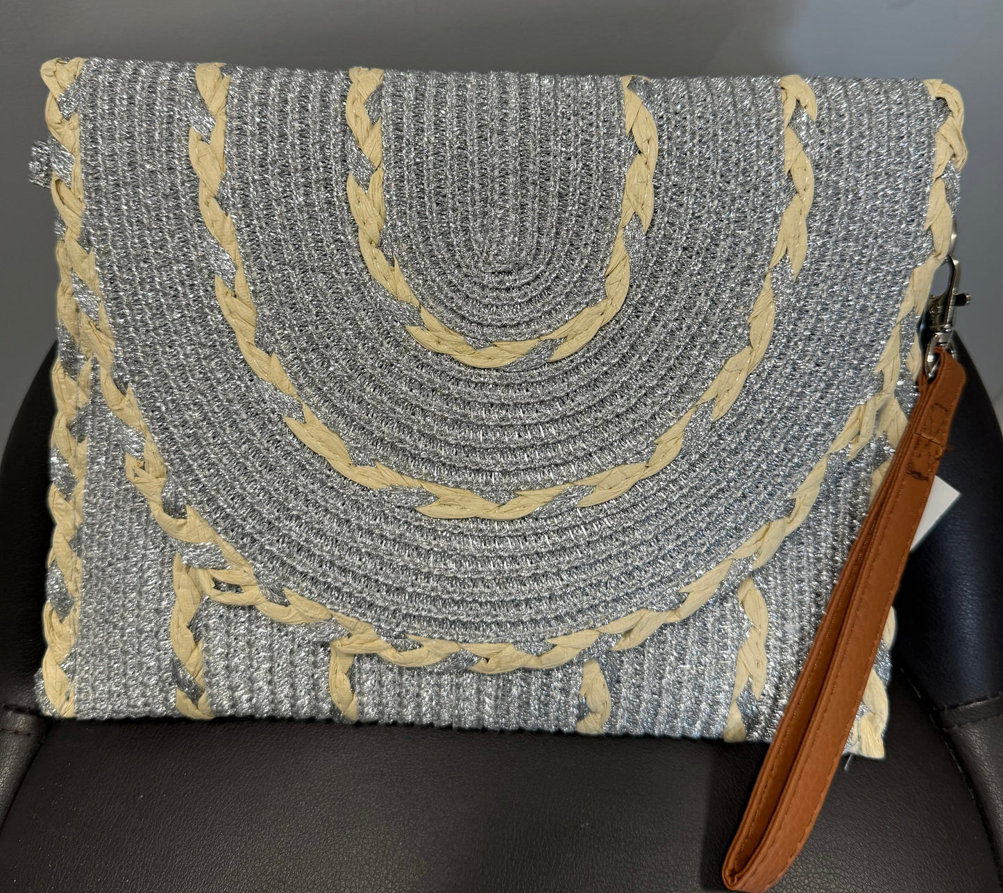 Sparkly Silver Clutch Bag On a grey background 