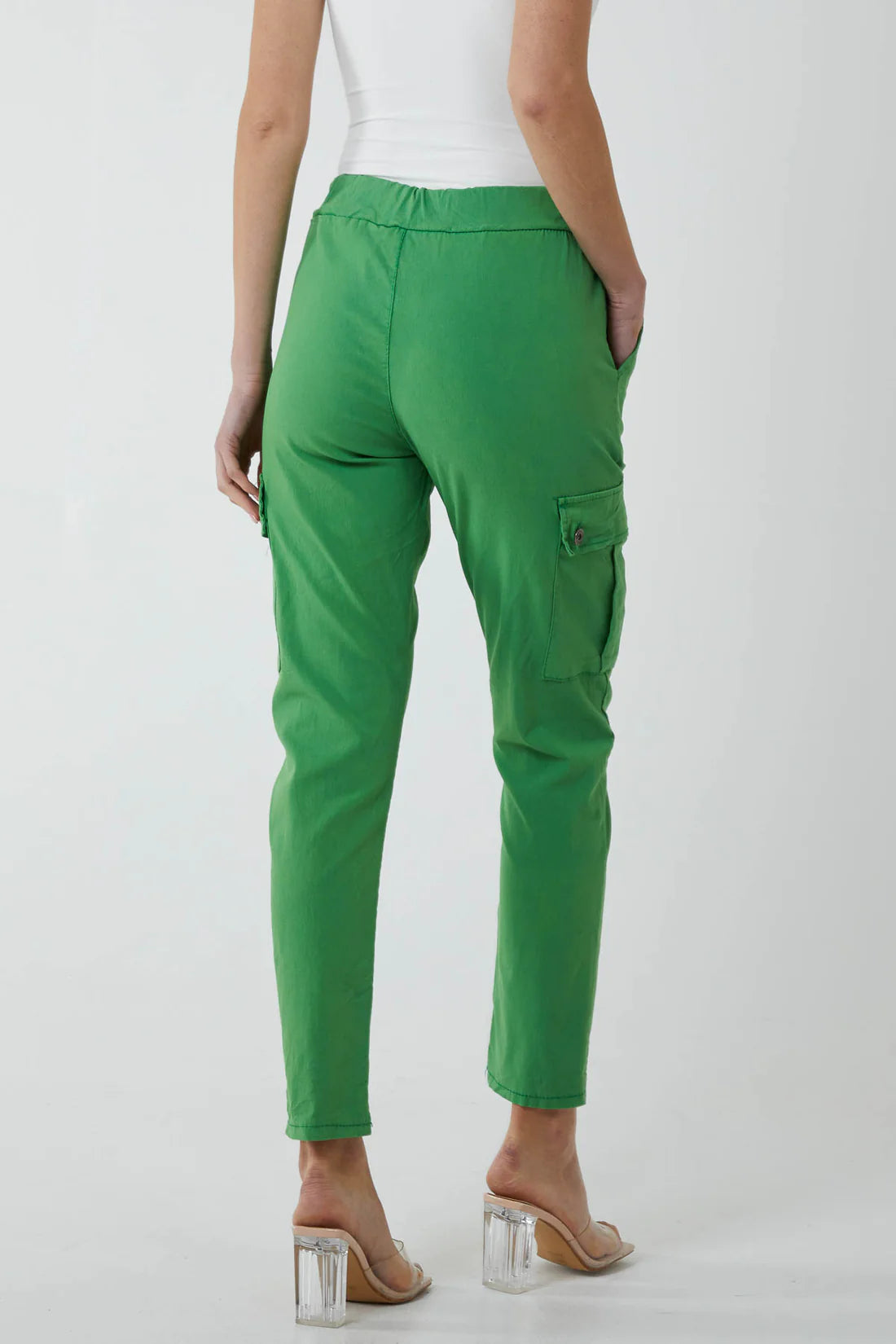 Woman wearing Jade Green Magic Cargo Trousers. Back view.