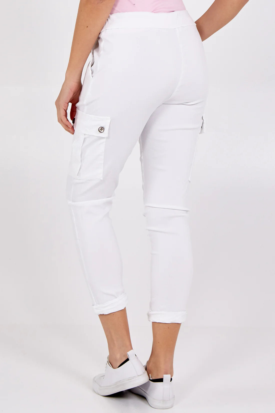 Woman wearing White Magic Cargo Trousers. Back view.