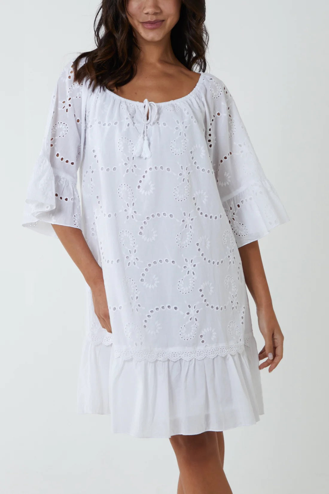 Woman wearing White Broderie Anglaise Bardot Dress